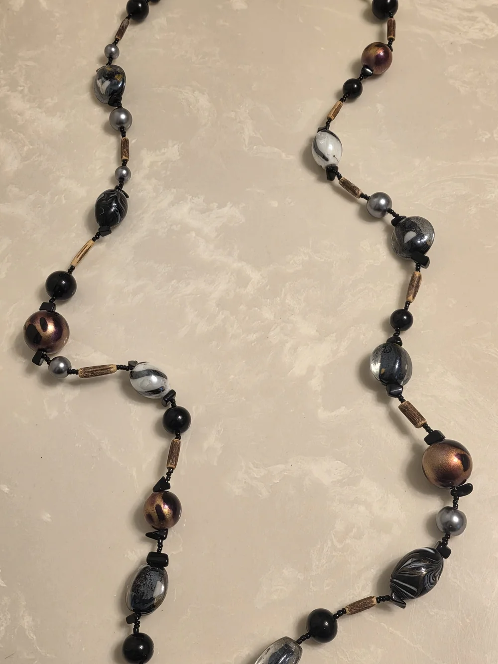 Elegant Multi-Strand Beaded Necklace in Black, Gray, Brown and Gold Tones